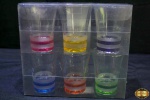 6 copos de shot em vidro com base colorida. Medindo 6,5cm de altura.