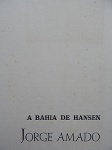 Hansen Bahia - Primeira folha dupla da tiragem especial editado em 1957 do Livro "A Bahia de Hansen - Jorge Amado", 2ª tiragem de somente 50 exemplares, sendo esta folha de nº 35, com a assinatura de Hansen. Medidas: 42 cm x 29 cm.