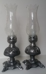 Belo par de antigas  Luminárias  Portuguesas, em bronze espessurado em prata, trabalhos em relevo, belas mangas em cristal com bordas onduladas. Assinada C. Borges - Lisboa,  altura 42 cm.