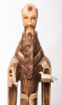 ARTE POPULAR - São francisco de Assis, escultura tosca confeccionada em monobloco de madeira nobre com policromia. Med.: 80 cm.