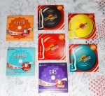COCA COLA - Colecionismo: lote contendo 7 mini discs Coca Cola Vibe Sound em suas respectivas embalagens originais. Medem 8,5 x 8,5 cada