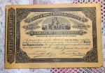 Apólice nº 00.403 do BANCO DOS COMMERCIANTES no valor de 100 mil Réis datada de janeiro de 1890. Mede 19 x 27,5 cm.