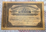 Apólice nº 00.450 do BANCO DOS COMMERCIANTES no valor de 100 mil Réis datada de janeiro de 1890. Mede 19 x 27,5 cm.
