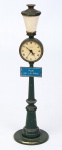 Jaeger - relógio de mesa em metal policromado em forma de poste francês com placa ( Rue de La Paix). Med: 0,29 x 0,08 cm.
