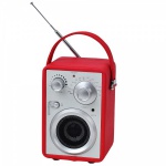 Rádio AM/FM com speacker, rádio revestido de couro ecológico em belo tom vermelho. Medida 46cmx41cmx31,5cm. Sem uso e na caixa original.