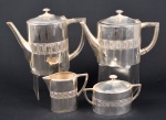 WMF - Conjunto com 1 búle para café, um búle para chá, uma leiteira e um açucareiro em metal prateado. MEDIDA  maior 19 x 23 cm e menor 13 x 10 cm .