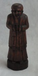 Estatueta em madeira nobre imagem de Padre Cícero base em granito. Altura 16 cm. Sec. XX.