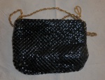 Bolsa feminina preta para noite, interior forrado em couro preto, fabricação americana.