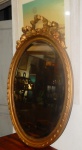 Espelho  bisotado com moldura   em madeira. Med. 90 x60 cm (desgastes)
