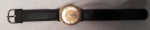 TISSOT - Relógio de pulso marca Tissot. Caixa redonda em metal banhado a ouro. Movimento a corda. 3,5 cm , corda arrebentada
