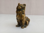 Estatueta em Bronze Representado Cachorro; aprox. 5,5 x 4 x 2,5cm, pesa aprox. 170 gramas, marcas do tempo