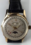 Relógio Jean Richard Automático, triple date, fases de lua, década de 60, caixa folheada a ouro de 33 mm de diâmetro, fundo em aço inox, em perfeito estado de conservação e funcionamento