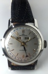 Relógio Movado automático, triple date, caixa de 32 mm de diâmetro em aço inox, década 60, em perfeito estado de conservação e funcionamento