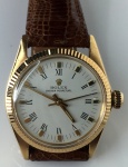 Relógio Rolex Oyster Perpetual, década 80, caixa 29 mm de diâmetro, de ouro amarelo, original, automático, mostrador original, em perfeito estado de conservação, pulseira de pele