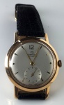 Relógio Omega Automático martelo, década 60, máquina original em caixa de ouro rosé 18 k adaptada de 28 mm de diâmetro, em perfeito estado