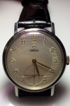 Relógio Omega Mecanismo a Corda,  caixa de aço inox de 34 mm de diâmetro original, década de 60, em perfeito estado