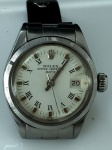 Relógio Rolex Oyster Perpetual Date Feminino, caixa de aço inox de 25 mm de diâmetro com pulseira da aço inox original, mostrador com cifras em algarismos romanos