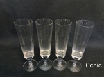 4 F taças flutes em cristal com corpo liso e translucido. Medida: 18cm de altura.