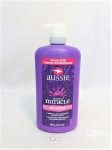 Condicionador Aussie Total Miracle 7N1 900ml. Embalagem não lacrada. Não garantimos a integridade do produto. Medida: 24cm de altura,