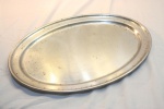 Travessa oval rasa em aço inox Fracalanza. Medindo 56cm x 41cm. Necessita limpeza.