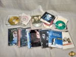 Lote de diversos cd's e dvd's.