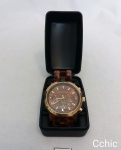 Relógio de pulso feminino   Michael Kors., pulseira tartaruga fundo marron Funcinamneto desconhecido. Não testado.