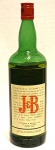 WHISKY ESCOCÊS J&B , GARRAFA LACRADA, PERTENCENTE A UMA COLEÇÃO DE BEBIDAS. Em 1749 Giacomo Justerini fundou uma companhia importadora de vinhos em Londres entrando, em 1779, para o comércio de scotch Whisky. Em 1831, com a compra da companhia pelo inglês Alfred Brooks, nascia a J&B: Justerini & Brooks LTD. J&B Rare Scotch Whisky é hoje a 2º marca de scotch whisky mais vendida do mundo. Sua colaboração clara é proveniente do contato do whisky com o barril de carvalho, com pouca adição de caramelo, diferentemente dos demais whiskies do mercado. Certo grau de evaporação