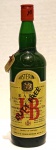 WHISKY ESCOCÊS J&B , GARRAFA LACRADA, PERTENCENTE A UMA COLEÇÃO DE BEBIDAS. Em 1749 Giacomo Justerini fundou uma companhia importadora de vinhos em Londres entrando, em 1779, para o comércio de scotch Whisky. Em 1831, com a compra da companhia pelo inglês Alfred Brooks, nascia a J&B: Justerini & Brooks LTD. J&B Rare Scotch Whisky é hoje a 2º marca de scotch whisky mais vendida do mundo. Sua colaboração clara é proveniente do contato do whisky com o barril de carvalho, com pouca adição de caramelo, diferentemente dos demais whiskies do mercado.