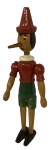 Pinocchio em madeira, brinquedo antigo articulado, medindO; 40 cm alt.