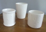 Tres potes em porcelna ORYBA  -  Diâmetros: 8 cm e 10 cm e 9 cm e Alturas9,5 cm , 12 cm e 9,5 cm: