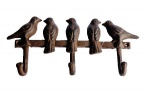 Cabideiro em ferro fundido com motivo de pássaros contendo 3 (três) ganchos. Medida 23cm.