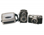 Conjunto de três antigas maquinas fotográfica. 
