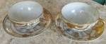 Duas elegante xícaras em porcelana chinesa, casca de ovo, com detalhes em dourado - Diâmetro: 10 cm ( boca xícara)