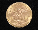 Moeda de Vinte Pesos Mexicanos em ouro de 1959. Med. 2,7 cm de diâmetro. Peso 16,7 gr. ( Por questão de segurança esse item não se encontra em nossa loja ).