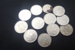 Lote com Vinte três moedas de cinco cruzeiros, algumas representando fauna brasileira.