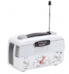 Rádio RETRO VINTAGE ao estilo da década de 50' com lindo dial para mudanças de estações. Rádio AM-FM, confeccionado em plástico rígido na cor branco com circuito transistorizado e alimentação por 3 pilhas pequenas. Medidas 17x 7x10 cm. Rádio funcionando, sem uso, com manual e caixa original.