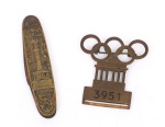 COLECIONISMO - Antigo canivete alemão com inscrições " Berlin - Sieges Saule" decorado com monumentos da cidade e um distintivo da "Olimpiada de Berlim de 1936".