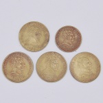 Lote composto por 5 moedas Uruguaias sendo uma moeda de 5 Pesos e quatro moedas de 10 pesos.