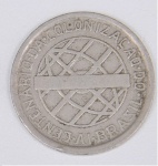 Lote composto de uma moeda de 200 Réis , comemorativa do IV Centenário da Colonização do Brasil, 1532-1932.