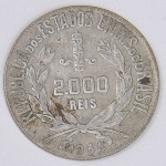 Lote composto por uma moeda de 2000 mil Réis cunhada em 1934.