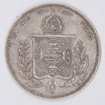 Lote composto por moeda  do Império Brasileiro, de 1000 Réis cunhada em 1857, IN HOC SIGNO VINCES.