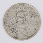 Lote composto por moeda de 2000 Réis, comemorativa do IV Centenário da Colonização do Brasil 1532-1932.