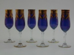 Seis taças para champagne em cristal veneciano na cor  azul e ouro.Altura 20 cm.