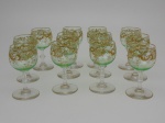 Doze taças de cristal Saint Louis  francesas na cor verde com decoração em ouro, altura  12,5 cm.