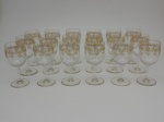 Dezoito taças de cristal Saint Louis ,  francesas com decoração a ouro, altura 15,5 cm.