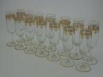 Quatorze taças de cristal  Saint Louis, com decoração a ouro, altura  17,5 cm.