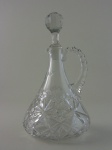 Garrafa ou licoreira em cristal lapidado com alça, altura 27 cm , largura 15 cm.