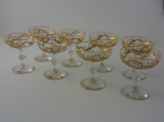 Oito taças de cristal Saint Louis , francesas com decoração a ouro, altura 11 cm.