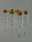 Seis taças em cristal para champagne flute com decoração em ouro. Altura 20 cm.