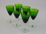 Seis copos em cristal canelado pára licor  na cor verde, altura 10 cm.